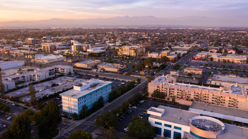 Sunset aerial view of downtown Downey