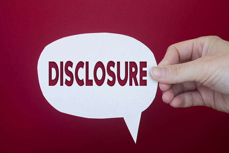 Speech bubble in front of colored background with Disclosure text.